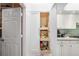 Pantry includes pull-out shelves, providing plenty of storage space at 5706 Bent Oak Dr, Sarasota, FL 34232