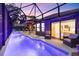 Inviting pool area with screened enclosure and adjacent bedroom access at 5706 Bent Oak Dr, Sarasota, FL 34232
