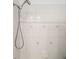 Shower with handheld shower head and tiled walls at 5706 Bent Oak Dr, Sarasota, FL 34232