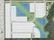 Community aerial view showing lake, park, and home sites at 6912 Prairie Oak Way, Nokomis, FL 34275