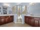 Double vanity bathroom with a large walk-in shower and ample storage at 7134 Westhill Ct, Lakewood Ranch, FL 34202