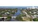 Beautiful aerial view showcasing the residential area and a water canal nearby at 850 S Tamiami Trl # 227, Sarasota, FL 34236