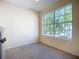 Bright bedroom with a large window allowing natural light and scenic views at 850 S Tamiami Trl # 227, Sarasota, FL 34236