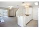 Spacious living room and kitchen area with modern appliances and neutral tones at 850 S Tamiami Trl # 227, Sarasota, FL 34236