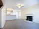 The open-concept living room features a fireplace and a seamless connection to the kitchen at 850 S Tamiami Trl # 227, Sarasota, FL 34236