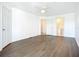 Bright bedroom with wood floors and doors to bathroom and closet at 850 S Tamiami Trl # 227, Sarasota, FL 34236