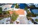 Single story home with circular driveway and canal views at 9820 Royal Palm Dr, Bradenton, FL 34210