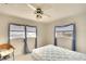 Bedroom with double bed, ceiling fan, and window coverings at 9820 Royal Palm Dr, Bradenton, FL 34210