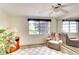 Gathering room with seating, built-in shelving, and large window at 9820 Royal Palm Dr, Bradenton, FL 34210