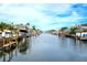 Calm canal with boats and docks in a peaceful waterfront neighborhood at 9820 Royal Palm Dr, Bradenton, FL 34210