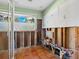 Bathroom under renovation with tiled floor and exposed plumbing at 1221 S Basin Ln, Sarasota, FL 34242