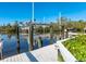 Private boat lift and dock with access to the waterway at 1221 S Basin Ln, Sarasota, FL 34242