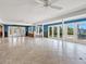 Open living space with blue walls and tile floors at 1221 S Basin Ln, Sarasota, FL 34242