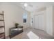 Light and bright bedroom with neutral carpet, ceiling fan, and large closet at 12343 Lavender Loop, Bradenton, FL 34212
