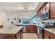 Modern kitchen featuring granite countertops and stainless steel appliances at 17118 Vardon Ter # 305, Bradenton, FL 34211