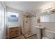 Clean bathroom with pedestal sink and shower at 1898 Wharf Rd, Sarasota, FL 34231