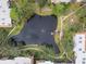 Directly above view of community lake and surrounding buildings at 305 30Th W Ave # A208, Bradenton, FL 34205
