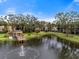 Beautiful community featuring a serene pond with fountain and gazebo at 305 30Th W Ave # A208, Bradenton, FL 34205