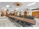 Spacious community room with long tables and chairs, perfect for gatherings at 305 30Th W Ave # A208, Bradenton, FL 34205