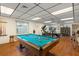 Recreation room with pool table and exercise equipment at 305 30Th W Ave # A208, Bradenton, FL 34205