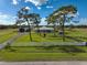 Aerial view of a single-Gathering home with pool and large yard at 3120 Lena Ln, Sarasota, FL 34240