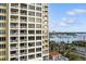 High-rise building with water and marina views; balconies and patio area at 35 Watergate Dr # 801, Sarasota, FL 34236