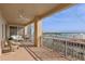 Serene balcony with seating and stunning water views at 35 Watergate Dr # 801, Sarasota, FL 34236