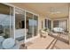 Serene balcony with sliding glass doors leading to the living area at 35 Watergate Dr # 801, Sarasota, FL 34236