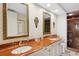 Elegant bathroom with double vanity and marble countertops at 35 Watergate Dr # 801, Sarasota, FL 34236