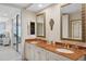 Bathroom with double vanity and marble countertops at 35 Watergate Dr # 801, Sarasota, FL 34236