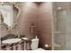 Stylish bathroom with a walk-in shower and granite vanity at 35 Watergate Dr # 801, Sarasota, FL 34236