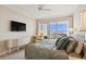 Spacious bedroom with water view and luxury bedding at 35 Watergate Dr # 801, Sarasota, FL 34236