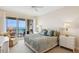 Comfortable bedroom with balcony access and bay views at 35 Watergate Dr # 801, Sarasota, FL 34236