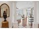Bright entry with hardwood floors and views to living room at 35 Watergate Dr # 801, Sarasota, FL 34236