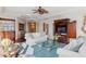 Living room features hardwood floors and built-in entertainment center at 35 Watergate Dr # 801, Sarasota, FL 34236