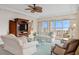 Living room with water views and ample natural light at 35 Watergate Dr # 801, Sarasota, FL 34236