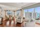 Spacious living room with hardwood floors and water views at 35 Watergate Dr # 801, Sarasota, FL 34236