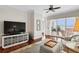Relaxing living area with hardwood floors, large windows, and city views at 35 Watergate Dr # 801, Sarasota, FL 34236