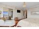 Elegant main bedroom with private balcony and water views at 35 Watergate Dr # 801, Sarasota, FL 34236