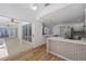 Bright kitchen, view of patio through sliding glass doors at 3791 Surrey Ln, Sarasota, FL 34235