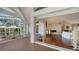 Seamless indoor/outdoor living with a spacious deck that connects to the living room and pool area at 3930 Elysian Woods Ln, Sarasota, FL 34231