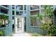 Building exterior with teal siding and white door at 4445 46Th W Ave, Bradenton, FL 34210