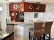 Kitchen with breakfast bar and granite countertops at 4445 46Th W Ave, Bradenton, FL 34210