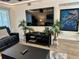 Living area with large TV, stylish furniture, and a calm atmosphere at 4445 46Th W Ave, Bradenton, FL 34210