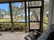 Enjoy water views from this screened porch at 4445 46Th W Ave, Bradenton, FL 34210