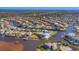 Expansive aerial view of waterfront homes and canals at 504 Mast Dr, Bradenton, FL 34208