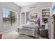 Bedroom with a bed, built-in shelves, and large window at 504 Mast Dr, Bradenton, FL 34208