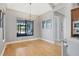 Spacious dining area with hardwood floors and large window at 504 Mast Dr, Bradenton, FL 34208