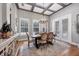 Elegant dining room with hardwood floors, chandelier, and access to backyard at 504 Mast Dr, Bradenton, FL 34208