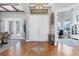 Bright and airy foyer with hardwood floors and access to formal dining area at 504 Mast Dr, Bradenton, FL 34208